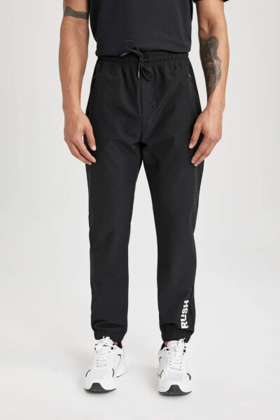 DeFactoFit Slim Fit Double Pocket Woven Sports Jogger Pants Black - 9