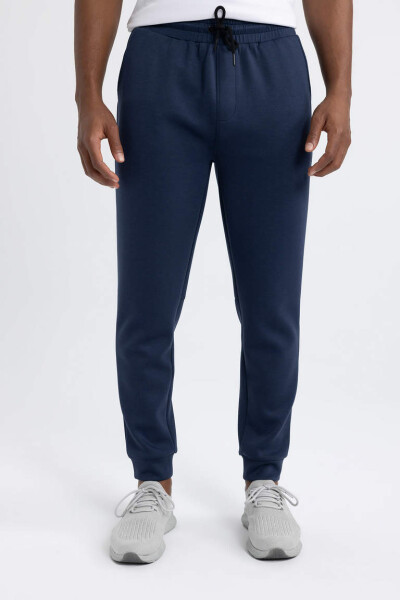 DeFactoFit Slim Fit Ikki Cho'ntakli Standart Oyoqli Skuba Sho'ng'uvchi Matodan Jogger Sport Shimi Ko'k - 3