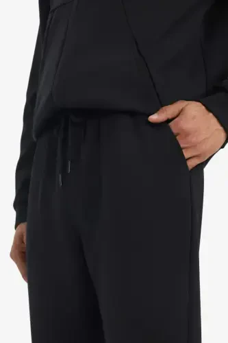 DeFactoFit Slim Fit Ikki Cho'ntakli Standart Oyoqli Skuba Suv O'ynaydigan Mato Jogger Shimim Qora - 7