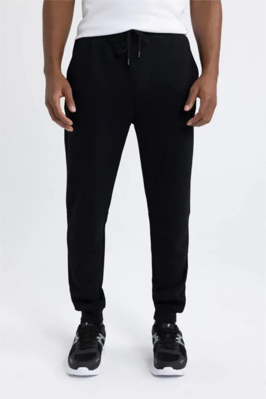 DeFactoFit Slim Fit Ikki Cho'ntakli Standart Oyoqli Skuba Suv O'ynaydigan Mato Jogger Shimim Qora - 6