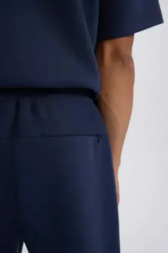 DeFactoFit Slim Fit Sportchi Ince Jogger Eshofman Alti Tor Kesim Skuba G'avvos Qumosh Standart Pocha Beli Bog'ichli Lastikli Pocha-Lacivert - 5