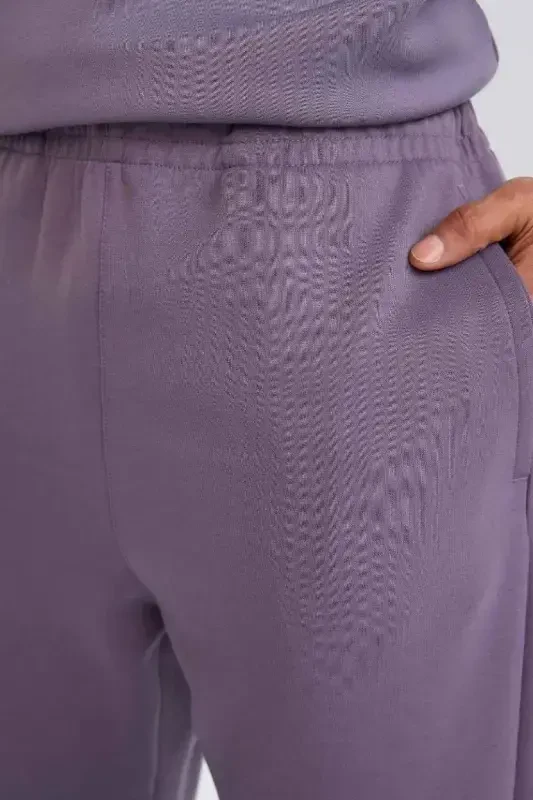 DeFactoFit Standart Fit cho'ntak detallari Jogger shim Skuba suvga sho'ng'uvchi matodan sport joggeri - binafsha - DEFACTO