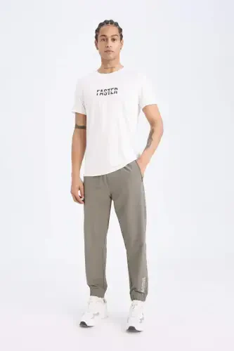 DeFactoFit To'quv Elastik Multifonksional Sportchi Jogger Sport Shim Slim Fit Tor Kesim Ikki Cho'ntakli-Haki - 7