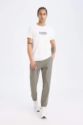 DeFactoFit To'quv Elastik Multifonksional Sportchi Jogger Sport Shim Slim Fit Tor Kesim Ikki Cho'ntakli-Haki - 9