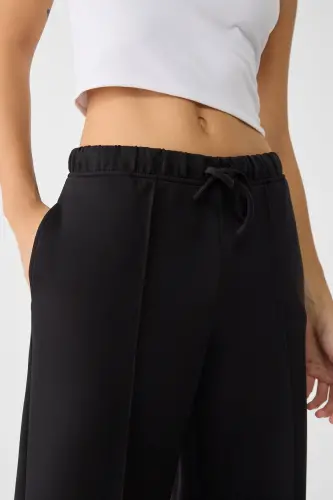 Dikiş detaylı ve yumuşak dokulu geniş paça pantolon-Siyah - 4