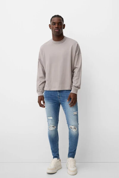 Distressed super skinny fit jean - BERSHKA (1)