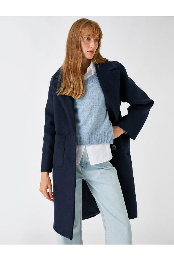 Double-breasted, wool blend coat with pockets. - 7