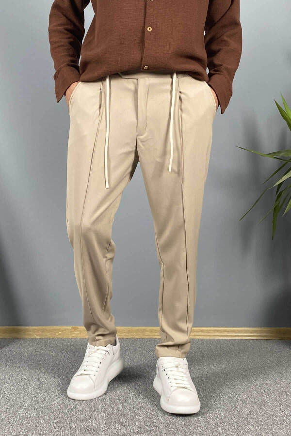 Double Pleated Jogger Pants - 15