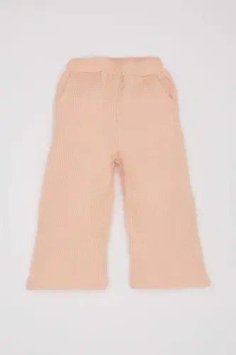 Двухпредметный костюм для девочки: вафельный свитшот с вышитым рисунком и велосипедным воротом, широкие свободные штаны с эластичным поясом. - DEFACTO (1)