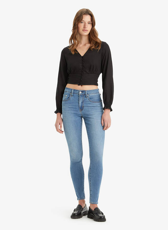 Джинсы женские Levi's 721 Skinny Fit светло-голубые с высокой талией - 8