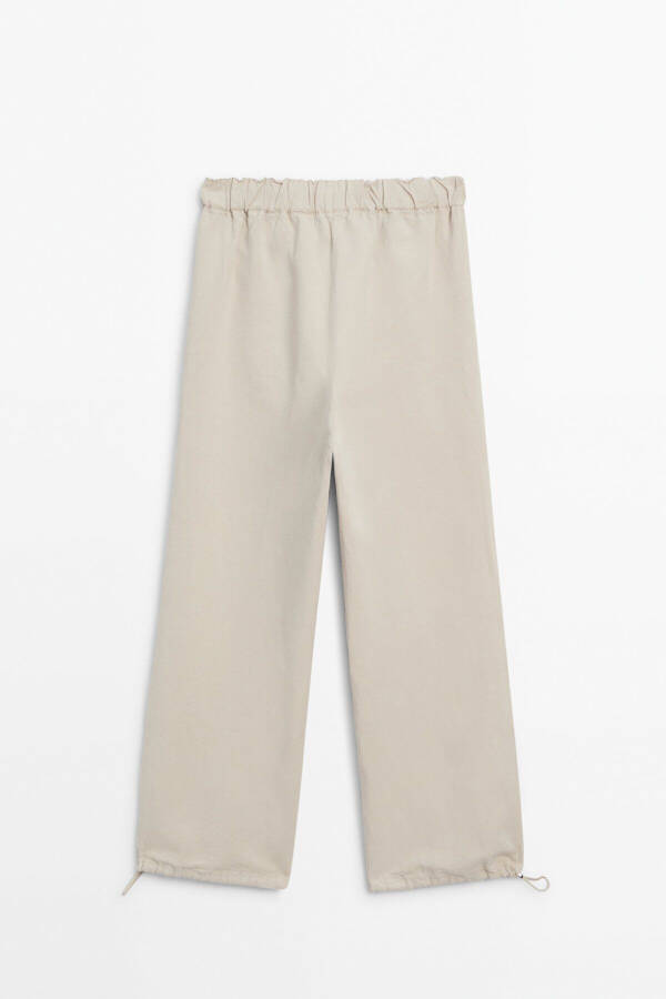 Elastic waistband and adjustable leg pants - 7