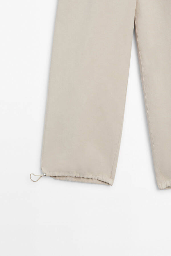 Elastic waistband and adjustable leg pants - 8