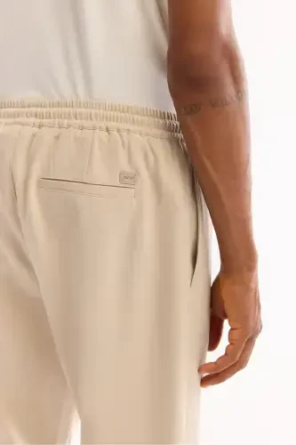 Erkak Bej Relaxed Fit Yondan Cho'ntakli Beli Rezinkali Bog'ichli Duble Pocha Jogger Shim E003000-Bej - 5