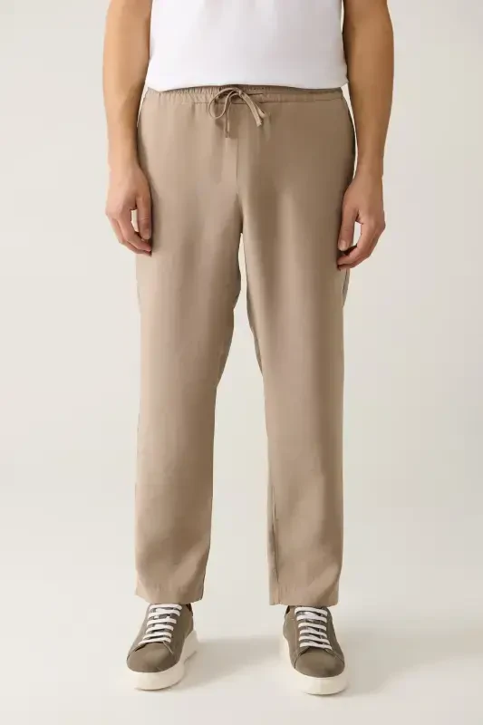 Erkaklar uchun bej rangli, elastik kamarli, modal, bo'sh kesilgan Truva Relaxed Fit shimi A41Y3031 - 3