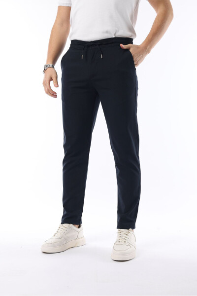 Erkaklar uchun ko'k rangli Jogger kesimi, elastik belbog'li, cho'ziluvchan likrali, slimfit mato pantolon - İDS COLLECTİON