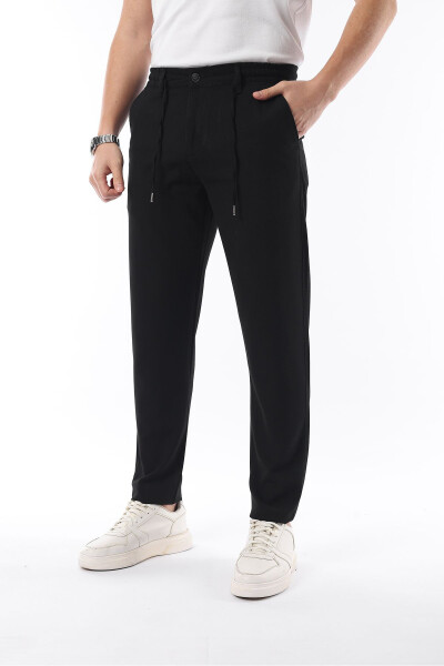 Erkaklar uchun qora rangli, bel qismi elastikli, cho'ziluvchan likradan tikilgan slimfit mato pantolon - İDS COLLECTİON
