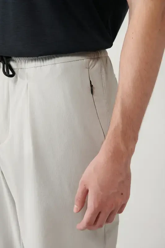 Erkaklar uchun tosh bellikli elastik bog'ichli fermuar cho'ntakli suvga chidamli Bi Stretch Relaxed Fit shim A41y3235 - 7