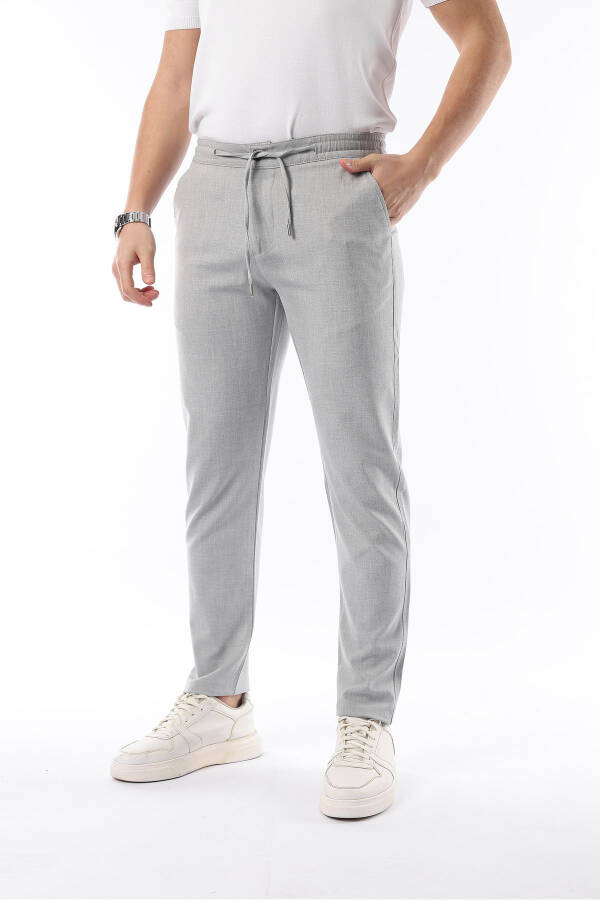 Erkek Açık Gri Jogger Kesim Bel Lastikli Esnek Likralı Silimfit Kumaş Pantolon - AÇIK GRİ - 1