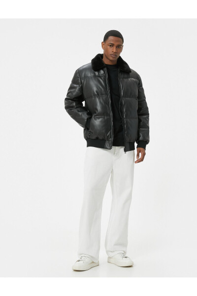 Faux leather puffer jacket with fur collar and pockets. - 1