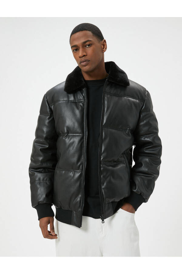 Faux leather puffer jacket with fur collar and pockets. - 2