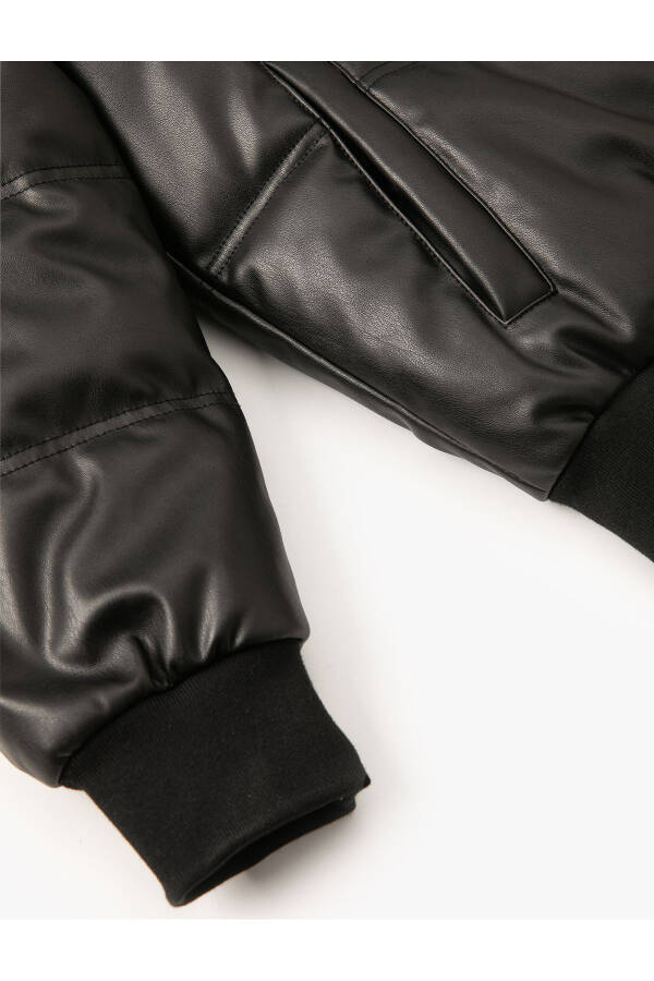 Faux leather puffer jacket with fur collar and pockets. - 7