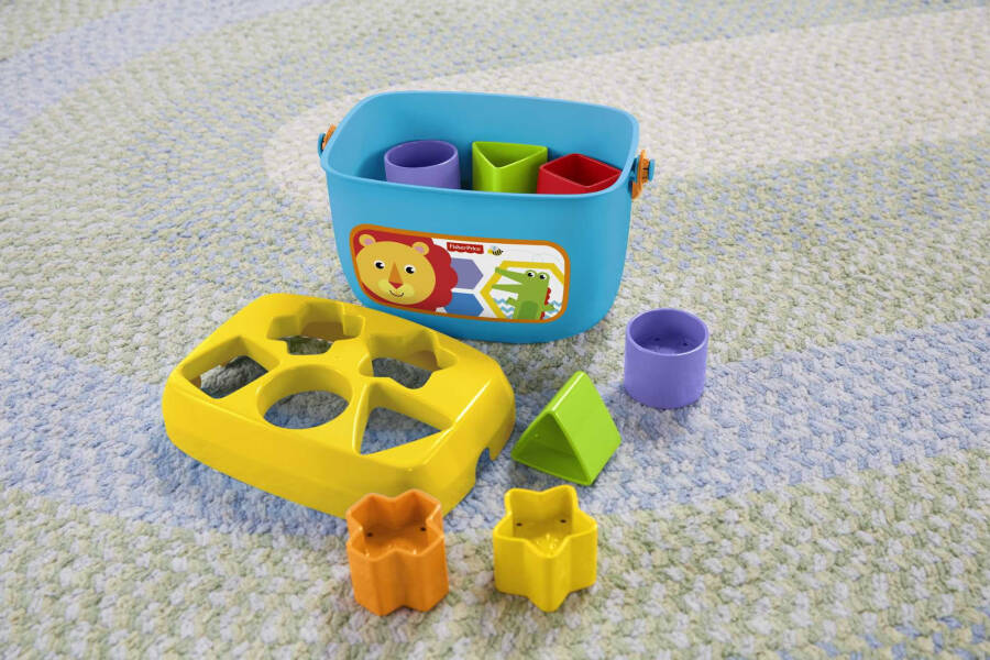 Fisher-Price Baby's First Blocks Shape Sorting Toy with Storage Bucket, 12 Pieces - 10