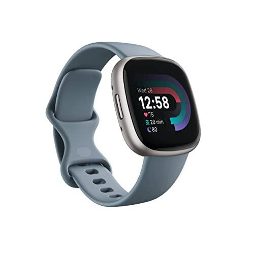 Fitbit Versa 4 Fitness Smartwatch kunlik tayyorlik, GPS, 24/7 yurak urishi tezligini kuzatish, 40 dan ortiq mashq qilish rejimlari, uxlashni kuzatish va boshqalar bilan, Waterfall Blue/Platinum, bitta o'lcham (S va L bantlari kiritilgan) - 1