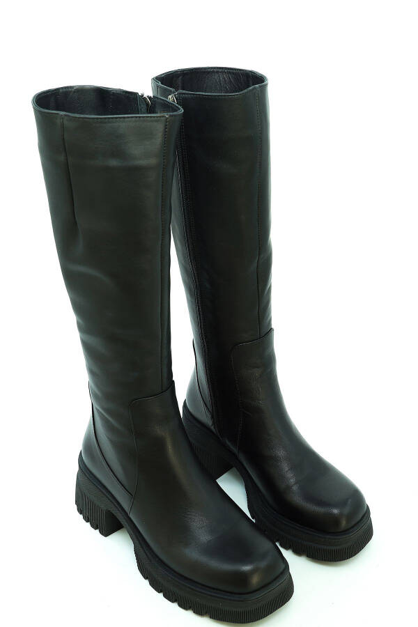 Genuine leather everyday ankle boot with thick sole and rubber detail. - 8