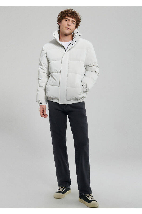 Gray puffer jacket, stand-up collar. - 1