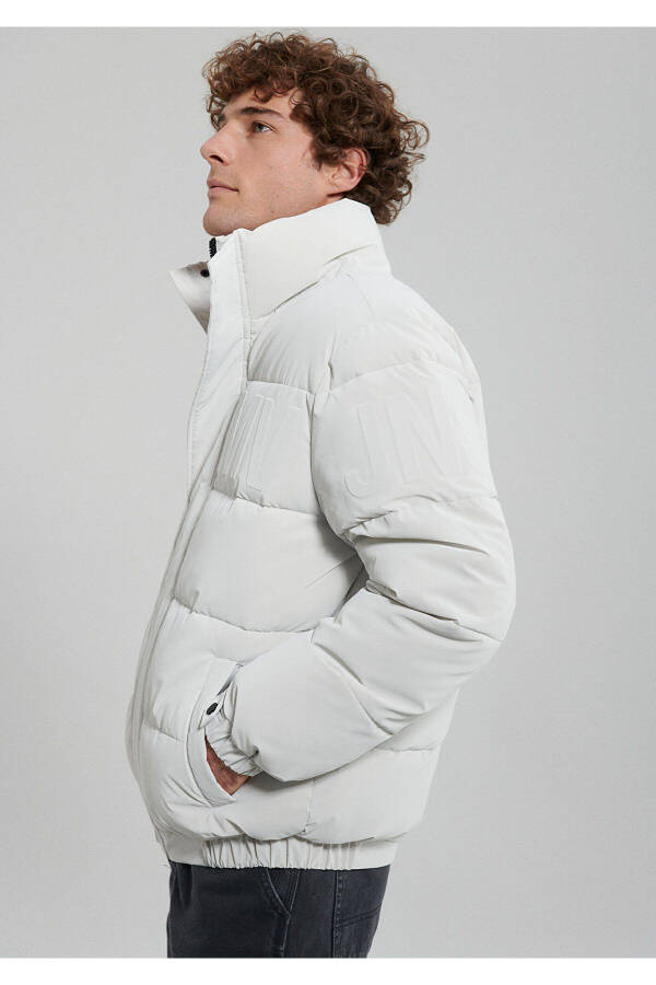 Gray puffer jacket, stand-up collar. - 3