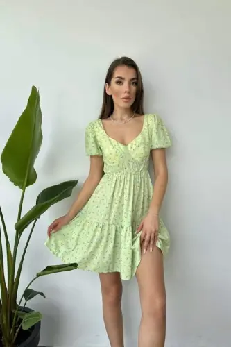 Green Dress with a Low Back - 1