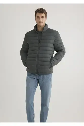 Green puffer jacket with a stand-up collar (0110016-71598) - 1
