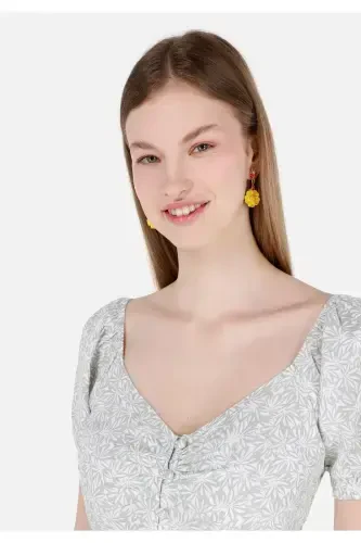 Green, short-sleeved, V-neck, slim fit, patterned women's shirt. - 4