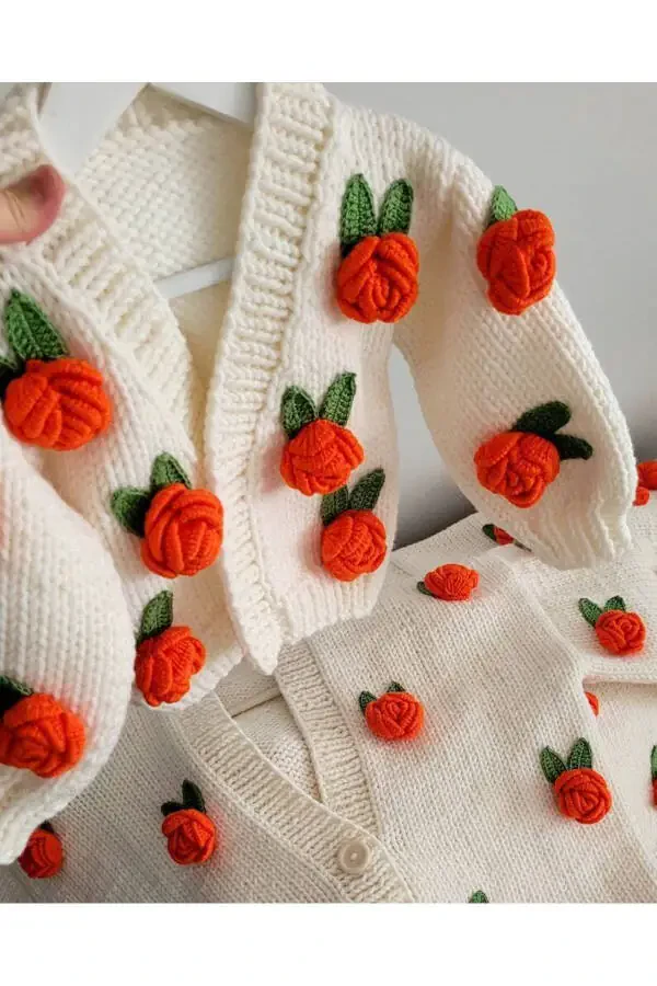 Hand knitted baby cardigan with flower details - 2