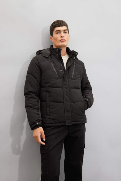 Heat-insulated Inflatable Jacket with Removable Hood, Fleece Lining, and Waterproofing in Black - 1