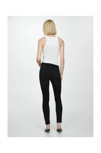 High-rise skinny jeans - Black denim - MANGO WOMAN (1)