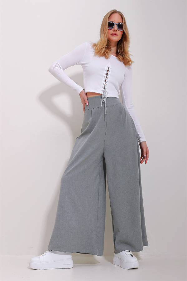 High-waisted, zippered, wide-leg woven pants. - 3