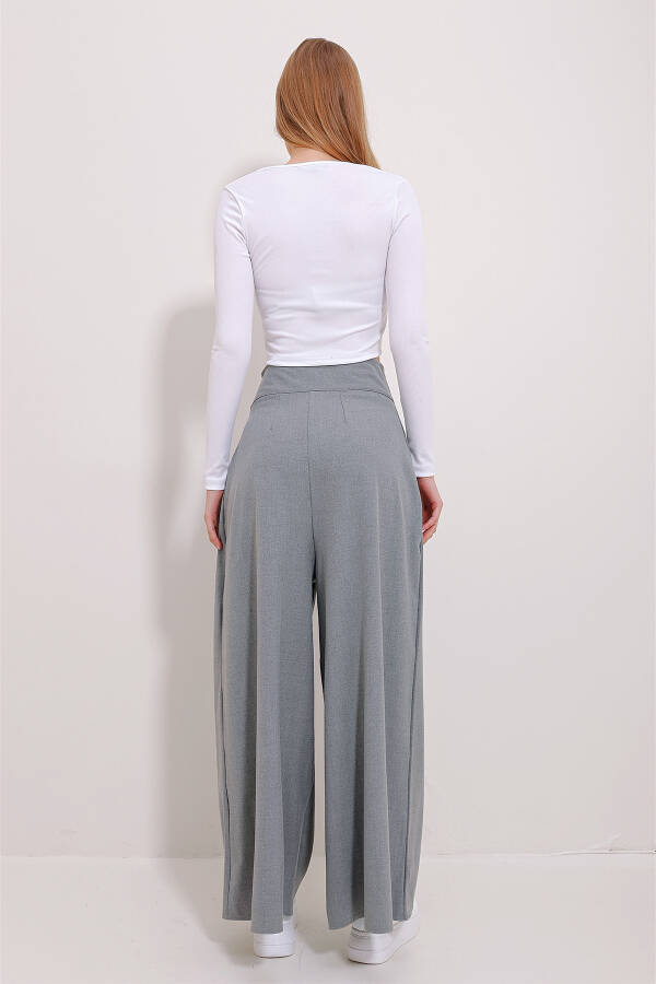 High-waisted, zippered, wide-leg woven pants. - 5