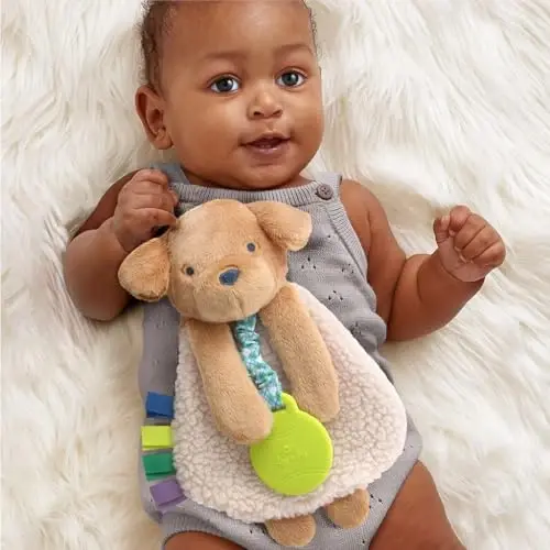 Itzy Ritzy - Itzy Lovey Including Teether - Baby Lovey with Teether, Textured Ribbons & Dangle Arms - Features Crinkle Sound, Sherpa Fabric and Minky Plush (Puppy) - 2