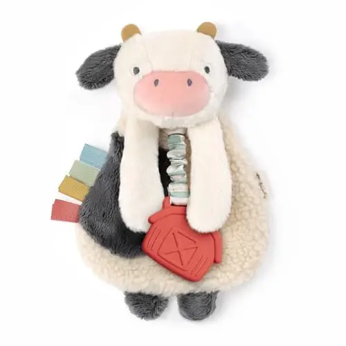 Itzy Ritzy - Itzy Lovey Including Teether - Baby Lovey with Teether, Textured Ribbons & Dangle Arms - Features Crinkle Sound, Sherpa Fabric and Minky Plush (Cow) 