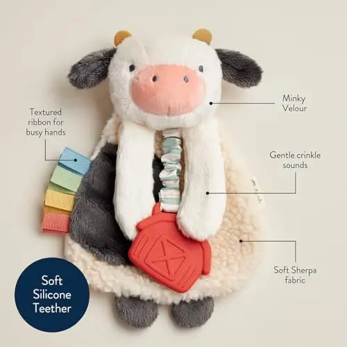 Itzy Ritzy - Itzy Lovey Including Teether - Baby Lovey with Teether, Textured Ribbons & Dangle Arms - Features Crinkle Sound, Sherpa Fabric and Minky Plush (Cow) - 2