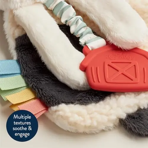 Itzy Ritzy - Tishlagichni o'z ichiga olgan Itzy Lovey - Tishlagichli chaqaloq Lovey, teksturali lentalar va osilgan qo'llar - Kirishimli tovush, Sherpa mato va Minky Plush (Sigir) - 4