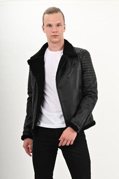 James Dean's iconic black leather biker jacket. - 2