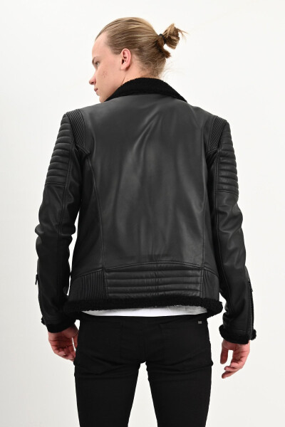 James Dean's iconic black leather biker jacket. - 5