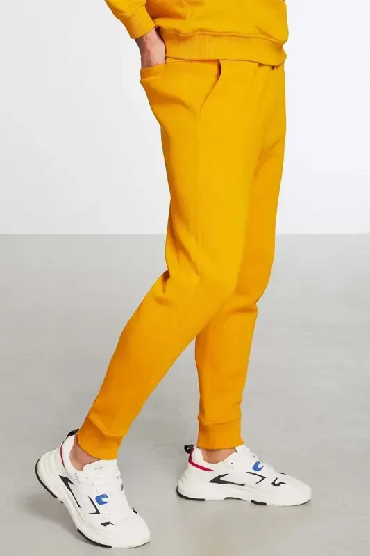 Jeremiah Men's Regular Leg Flexible Fabric Drawstring Waistband and Elasticated Pocketed Saffron Yellow Sweatpants-Saffron Yellow - 2