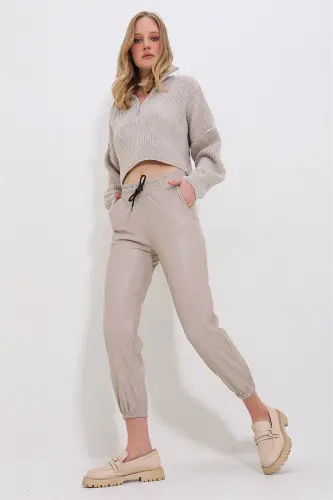 Kadın Bej Çift Cepli Bel Ve Bilek Lastikli İçi Şardonlu Casual Suni Deri Pantolon Alc-X7329-BEJ - 1