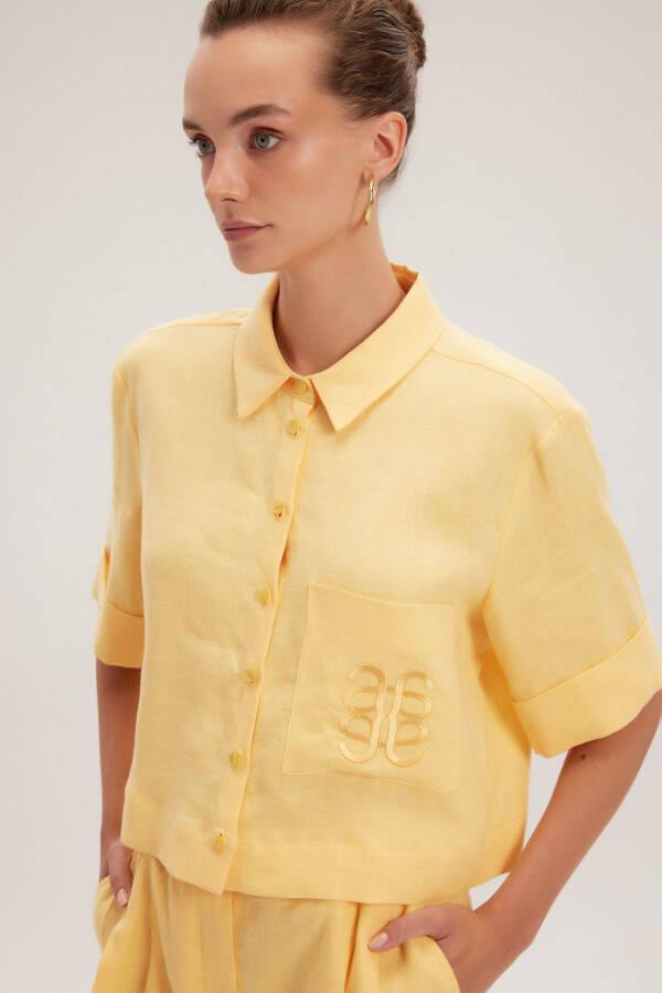 Kashi bilan logotipli ko'ylak - 4