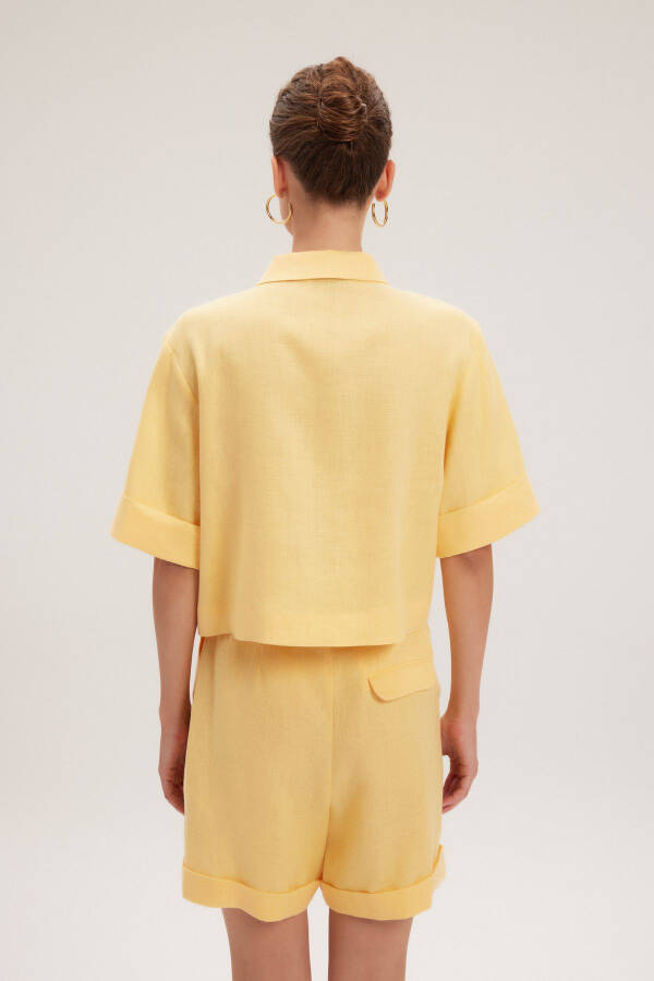 Kashi bilan logotipli ko'ylak - 5