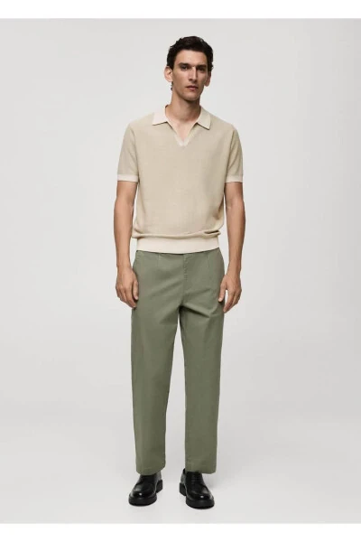 Kontraerli chiziqlar va naqshlari bilan polo futbolka - 4