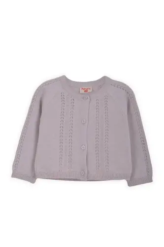 Lila baby cardigan with lace and pom-poms. 